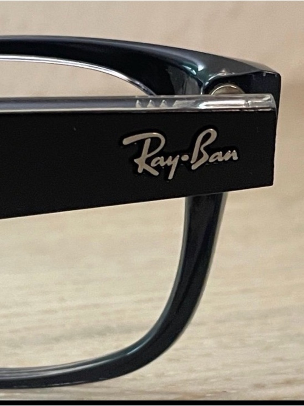 Ray-Ban Men’s Black Frame Sunglasses with Silver Logo Accent